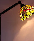 Tiffany Style Stained Glass Floor Lamp Dragonfly Vibe in Green and Red, close-up of adjustable arm with lit stained glass shade