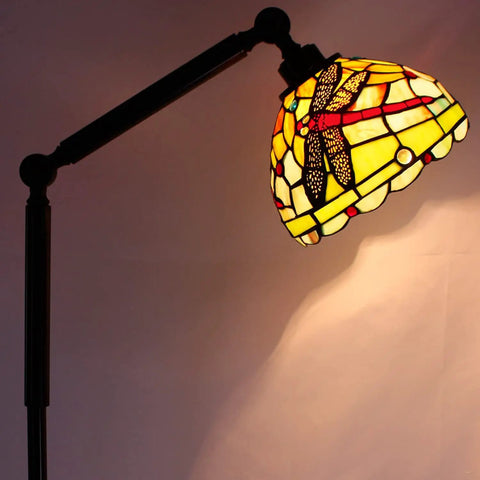 Tiffany Style Stained Glass Floor Lamp Dragonfly Vibe in Green and Red, close-up of adjustable arm with lit stained glass shade