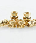 Brass Knurled Hot Melt Threaded Inserts Nuts M3 Size Lock In Solid For Wood And Plastic With Strong Hold To Handle Heavy Torque Stress Without Breaking; assorted sizes visible.