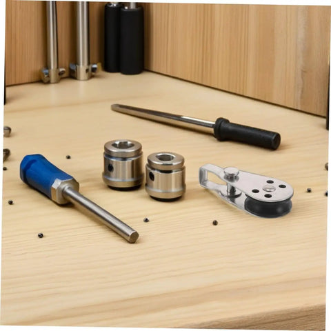 Workbench with tools and a Stainless Steel Sailing Pulley Block Set Four Pack With Bearing Wheels for smooth tension control.