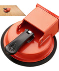 Floor Suction Cup Tool With Strong Vacuum Grip For Leveling Tiles And Laminate Planks, red with black handle, close-up view