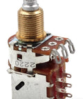 Front view of a 500k guitar push-pull potentiometer with brass threaded shaft and solder lugs.