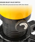 Close-up of the pressure relief valve switch on the hydraulic bearing puller for grease monkey workshops.