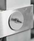 Fender washer: stainless steel round washer (1/8 in ID x 1 in OD) with threaded bolt and hex nut on metal frame
