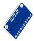 Back view of Four Channel I2C ADC Module with programmable gain amplifier for Arduino, Raspberry Pi, industrial apps, blue PCB.