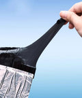 Real Deal Asphalt Roof Repair Tape in hand, showing durable, stretchy material designed for sealing roof leaks.