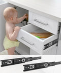 Seven Pair Eight Inch Black Soft Close Drawer Slides Heavy Duty Steel Ball Bearing Gliders in white cabinet with baby.
