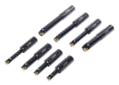 Beefy Round Shank Indexable Boring Bar 3/4 Inch With Dual TCMT Inserts laid out on white background