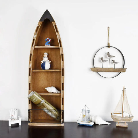 Wooden Boat Shelf With Three Shelves For Beachy Nautical Decor Free Standing Coastal Wall Display Ship Shape Bookcase Rustic Nautical Home Decor 32 Inch Long Perfect Gift For Beach Homes And Coastal Collectors showcasing decor elements.