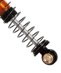 Close-up of 45mm Aluminum Threaded Oil Shock Absorbers For One Twenty Fourth FCX24 And FMS RC Cars, gold spring detail