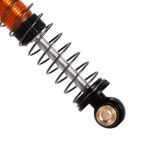 Close-up of 45mm Aluminum Threaded Oil Shock Absorbers For One Twenty Fourth FCX24 And FMS RC Cars, gold spring detail
