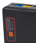 Close-up of Mini Ups Battery Backup 16000Mah Power Supply For Routers And Modems US Plug with power status display and ports.