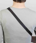 Back view of person wearing black Cross Chest Sling For Ukuleles, Mandolins, Classical Guitars And More, showcasing adjustable strap fit