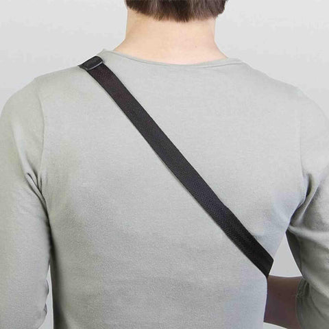 Back view of person wearing black Cross Chest Sling For Ukuleles, Mandolins, Classical Guitars And More, showcasing adjustable strap fit