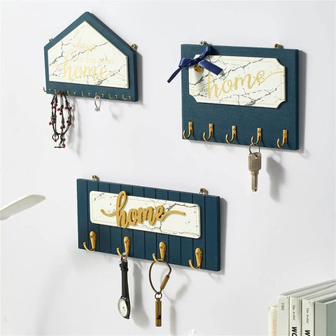 Slick Wall Mounted Wooden Coat Rack With Heavy Duty Hooks And Knockout Plaque Design Dang Neat Entryway Organizer For Keys Hats Robes Towels In Kitchen And Office Spaces on a wall.