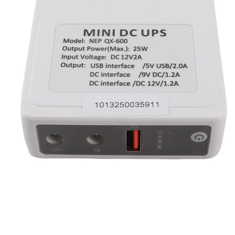 Bad Boy Mini UPS Battery Backup With 8000mAh showing input/output ports, compact design for routers, cameras, and devices.