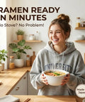 Woman in kitchen holding Microwave Ramen Cooker Bowl 50 Oz Capacity No Pot Needed With Lid Easy Noodles Maker Made In Japan