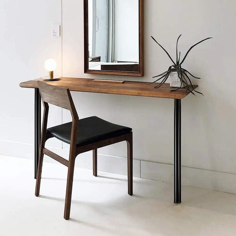 30 Inch Adjustable Metal Desk Legs Set Of 4 used in DIY wooden desk with black round legs and simple chair against white wall.