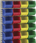 Colorful stacked storage bins in red, blue, green, and yellow mounted on a wall panel, showing organization diversity and space-saving.