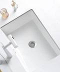 Real Heavy Hitter Stainless Steel Tub Drain Strainer And Shower Hair Catcher Drops Right In To trap strands in sleek white sink.