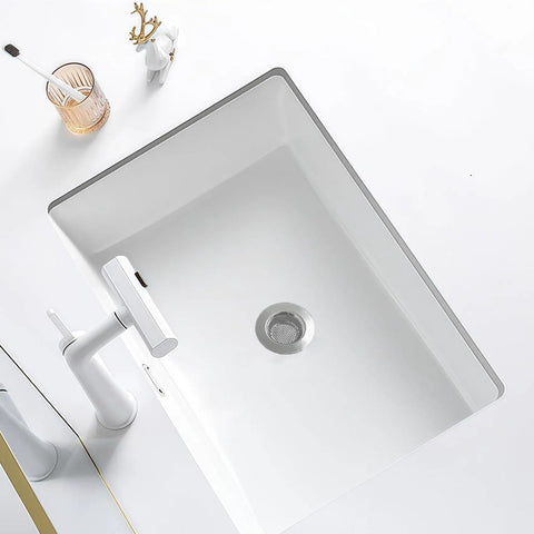 Real Heavy Hitter Stainless Steel Tub Drain Strainer And Shower Hair Catcher Drops Right In To trap strands in sleek white sink.
