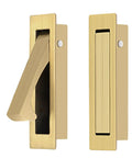 Sleek Two Pack Recessed Pocket Door Pulls With Zero Fuss Flush Mount Design And Comfortable Finger Groove For Seamless Sliding Interior Doors And Modern Home Furniture In Brushed Brass, showing brushed brass pocket door handles.