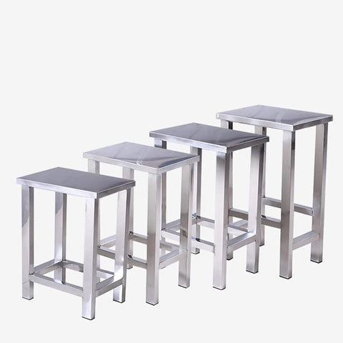 Sturdy 304 Stainless Steel Square Stools for factory lab workshop use, various heights, trapezoidal frame, non-slip feet, group view.