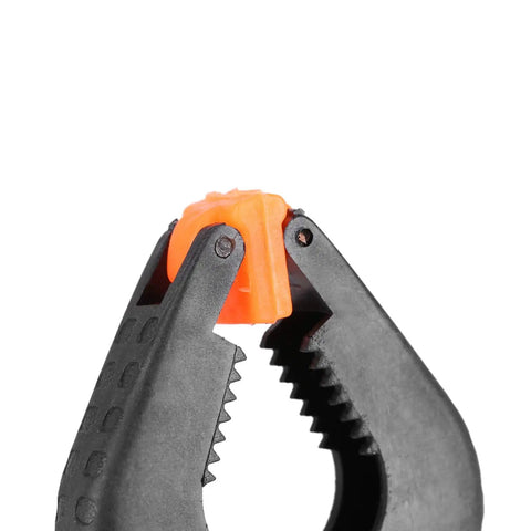 Close-up of 3 Inch Plastic Spring Clamps With Killer Anti Slip Grip Heavy Duty Woodworking And Backdrop Clips Hella Handy For Crafts Home Diy Total Flexible Tool Built Tough For Quick Projects.
