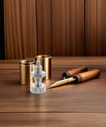 Self-Locking Stainless Steel Spring Plunger Pin With M10 Thread And Knurled Handle For Industrial Equipment Locking on wooden surface.