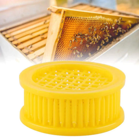 Yellow cage from Six Piece Beekeeping Queen Rearing Box Kit With Plastic Queen Cages For Isolation DIY Queen Production Pro Grade ABS Construction