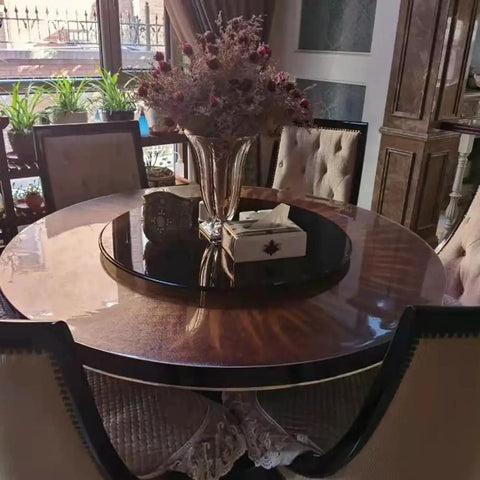 Tempered Glass Round Dining Table Lazy Susan Turntable Serving Tray 100 cm Diameter Black Ideal For Easy Food Sharing At Family Dinners And Parties Durable Rotating Plate For Smooth Mess Free Meals in dining setting with vase