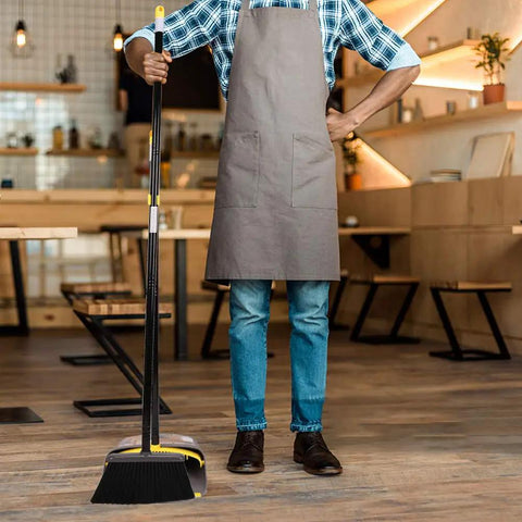 Heavy Duty Standing Broom And Dustpan Combo Set With Adjustable Long Handle in use by man wearing apron in cafe