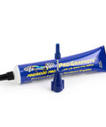Dry Graphite With Moly Lubricant For Pine Derby Car Axles Pro Grade Easy Apply Needle Tip Applicator shown with cap off