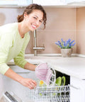 Woman placing pink baseball cap secured in a Three Pack Hat Washer Cage For Washing Machine And Dishwasher Cap Cleaner Frame into dishwasher.