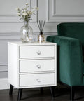 Six Pack White Sphere Drawer Knobs Featuring Dazzling Glass Rhinestones And A Sleek Premium Silver Finish To Level Up Your Kitchen Drawers And Bedroom Vanities on a white nightstand.