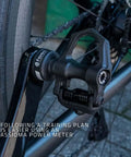 Assioma Uno Single Sensing Left Pedal Power Meter with Bluetooth and ANT Plus on road bike, close-up view