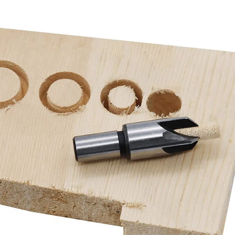 Legit Top Tier Wood Plug Cutter Drill Bit Set Eight Piece Collection Titanium Coated Steel on wood with drilled plugs.