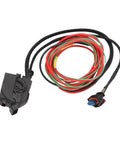 Heavy Duty Tesla Compatible Wiring Harness With Thick Insulation To Block Fraying And Shorts Craft with braided sleeve, red, green, and black wires.