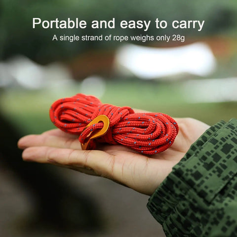 Hand holding 8 Pack 4mm Reflective Tent Guylines With Aluminum Adjuster Tensioner Ultralight Camping Ropes