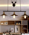 Fresh Vintage Industrial Billiard Chandelier Features Easily Adjustable Pulley Lift System In Classic Black Metal Three Light Ceiling Hanging Lamp Solid Pick For Dining Room Or Chill Loft, seen from below with illuminated bulbs.