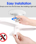 Hands installing LED Garage Ceiling Light With E26 Base And 3 Flexible Panels, 5000K Daylight, 30W, 3500 Lumens in socket