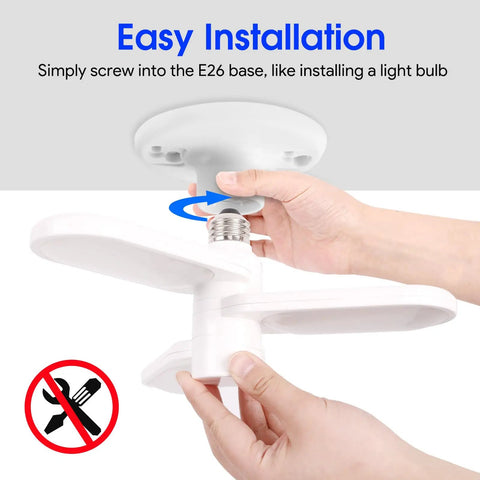 Hands installing LED Garage Ceiling Light With E26 Base And 3 Flexible Panels, 5000K Daylight, 30W, 3500 Lumens in socket
