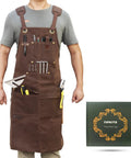Woodworking Apron With 9 Tool Pockets And Magnetic Chest Holders, 20 oz Waxed Canvas Shop Apron worn by person holding tools