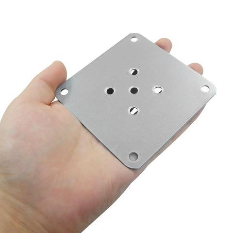 Built Tough These Heavy Duty Silver Metal Furniture Mounting Plates Keep Wobbly Couches And Chairs Rock Solid With Zero Hassle Rust Proof Base Pads Universal 100Mm Fit Easy Diy Fix Four Pack in hand.