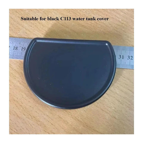 Black plastic half-circle water tank cover next to a ruler for CitiZ Coffee Machines C113, durable replacement lid.