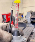 Gas Flow Meter For MIG TIG Welding With Pinpoint Accuracy And Easy Argon CO2 Compatibility User Friendly Interface And Pro Grade Quick Setup For Precise Gas Control Less Waste And Cleaner Welds In Your Projects. gas flow meter with clear tube, spring hook, and gray base for MIG/TIG gas control