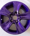 Candy Purple Transparent Polyester Powder Coat For Automotive Metals, Wheels, And Parts Slick High Gloss 1 Lb Finish Durable High Performance Coating With Rich Candy Color And Deep Blue Hint Made In USA on car wheel close-up