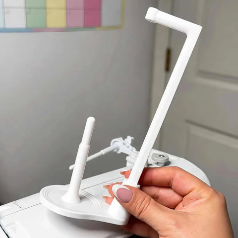 Heavy Duty Thread Spool Stand For Sewing Machines Featuring A Sick Anti Tangle Guide And Jumbo Cone Holder, white close-up