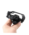 Mechanical disc brake caliper with resin pads held in hand, compatible for Shimano TX805 and M375 models, showcasing durable design.