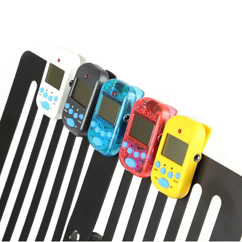 Rechargeable LCD Metronome For Musicians With 10 Beat Sounds Portable Clip On Tempo Meter in assorted colors on a music stand